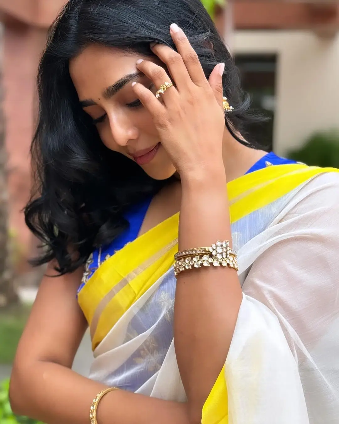 Aishwarya Lekshmi Wearing White Saree Blue Sleeveless Blouse